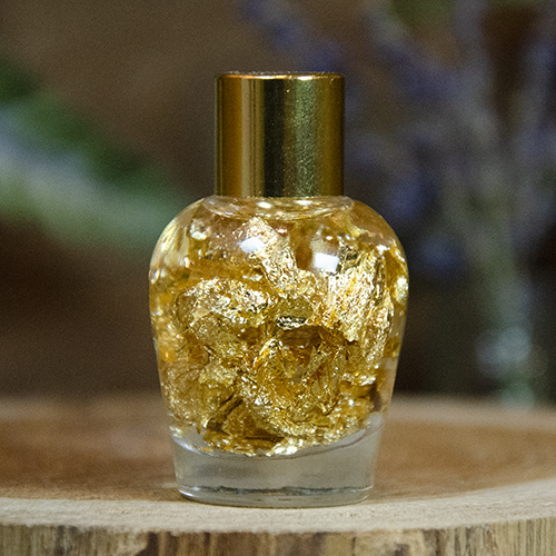 Gold Flakes in Mineral Oil